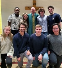 Father Thomas Curran with Student Senate Hospitality Group