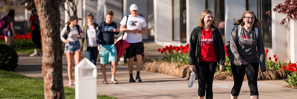 Students walking on campus quad