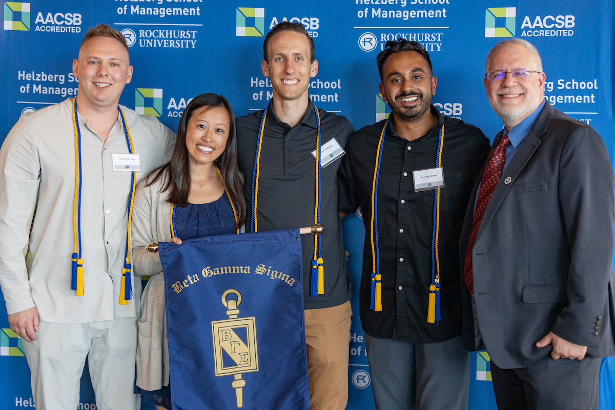 DO/MBA students pose with Dean Myles Gartland