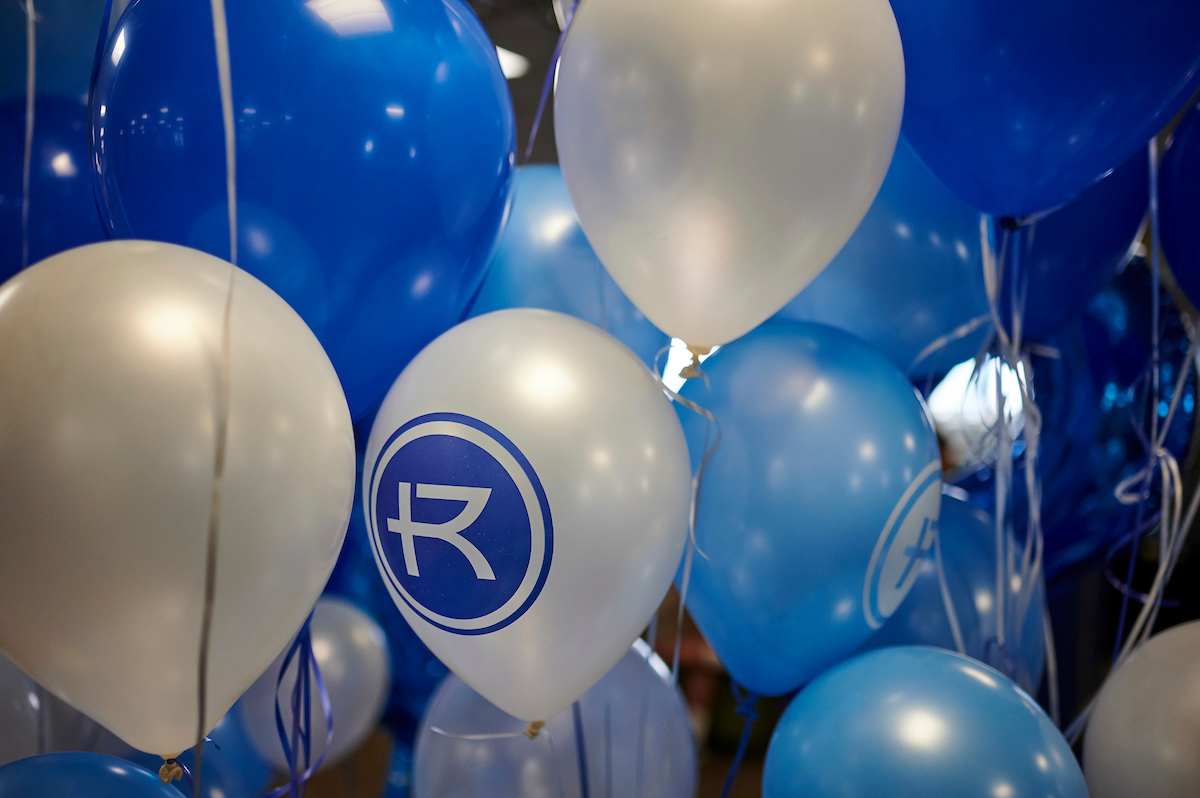 Rockhurst blue, white and light blue balloons in a bunch 