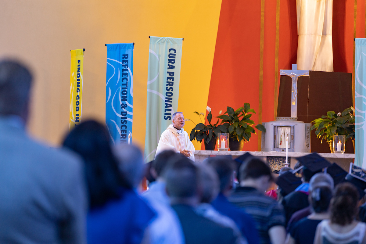 Father Stephen Hess, SJ, speaks during Baccalaureate Mass