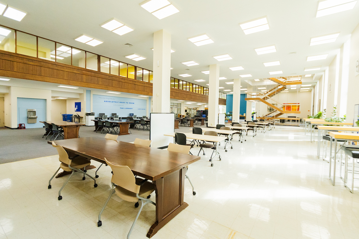 Library Interior with tables and stairs