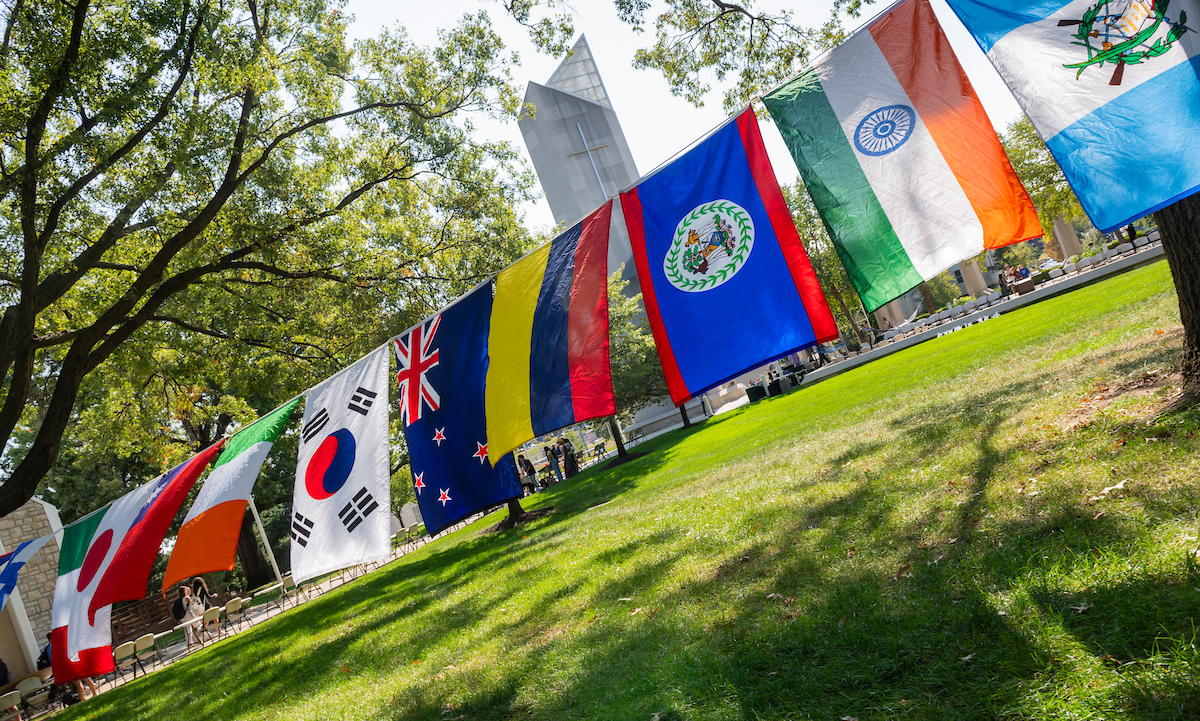 10 or so flags hang in front of the RU bell tower