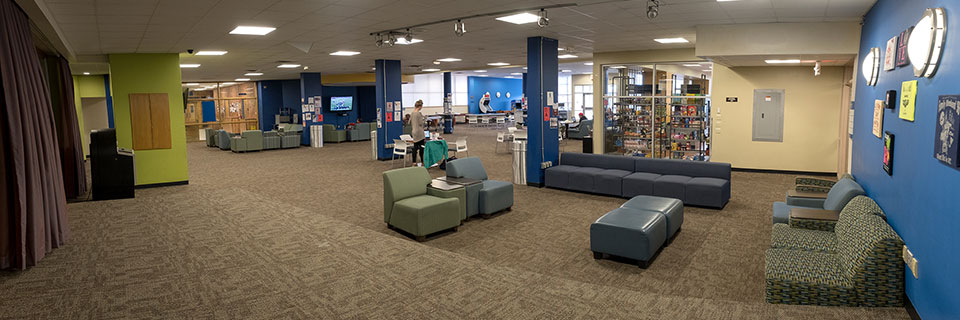 Rock Room from the stage (couches, tvs, pool table, video games, variety store)