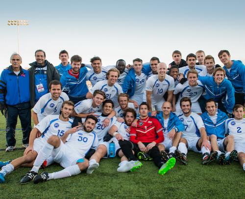 The men's soccer team celebrating a victory