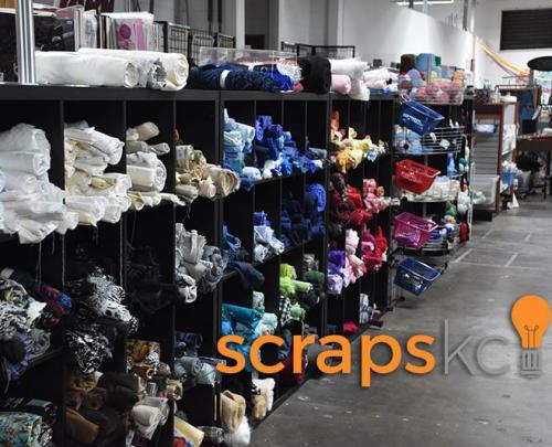 Scraps KC promotional photo with shelves of fabric lining the walls