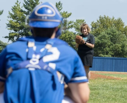 RU President Prepares for Royals First Pitch — With Help from Some Hawks