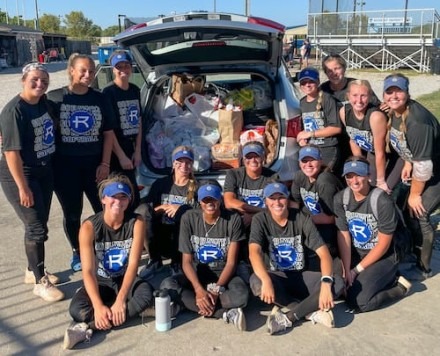 Softball Team Pitches In for SFX Pantry