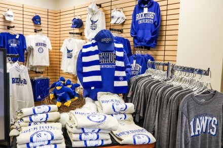 Shirts, scarves, and hats in the bookstore