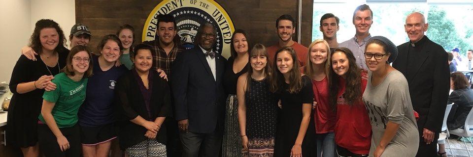 Students with Fr. Curran and Mayor Sly James