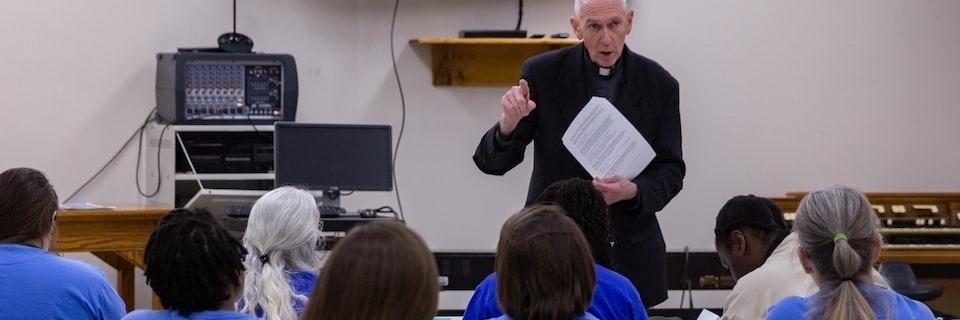 Fr. Curran teaching at the Chillicothe Correctional facility